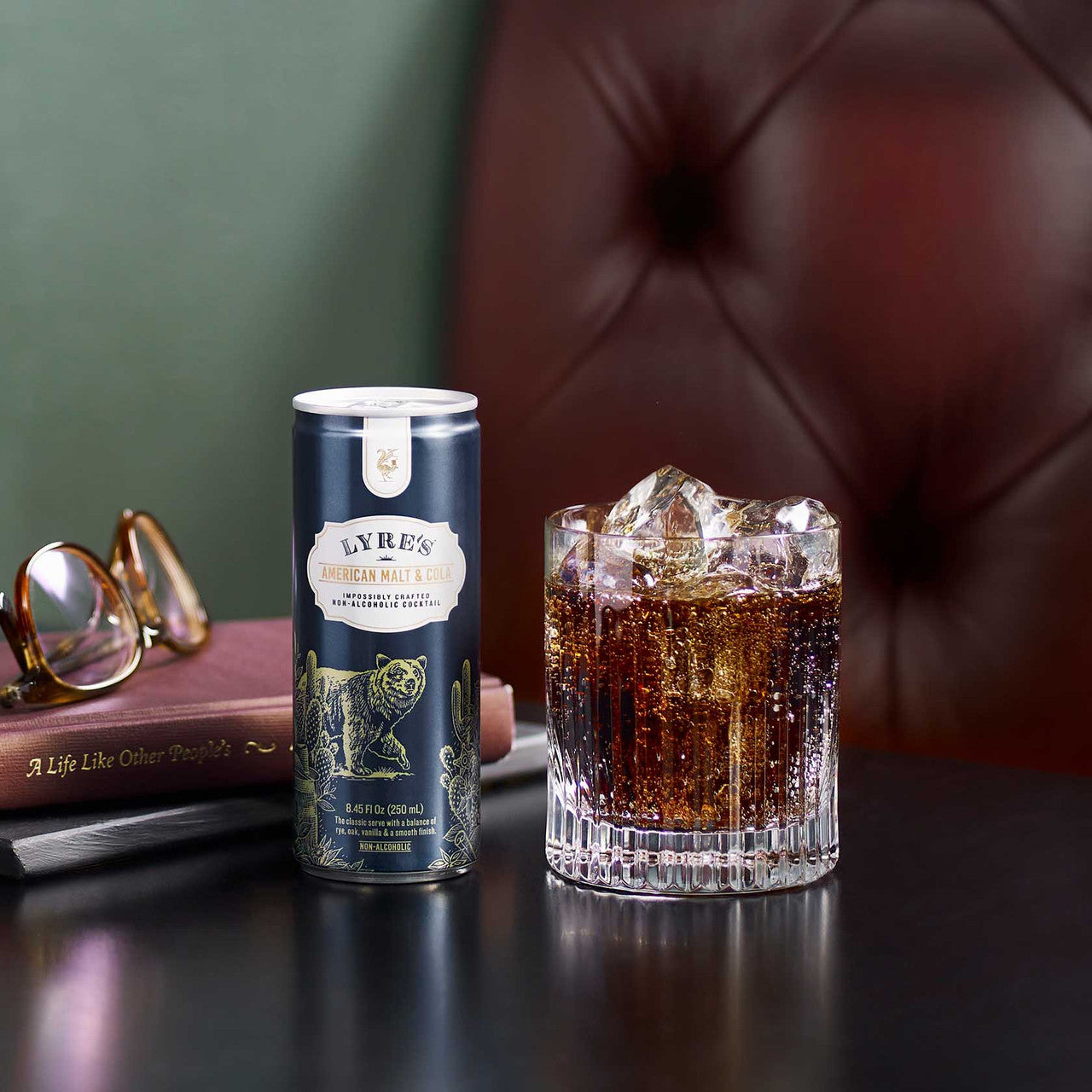 Lyres American Malt & Cola can cocktail served in a rocks glass