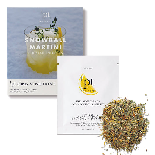 Two boxes of '1 pt' cocktail infusions with a small pile of herbs on a white background