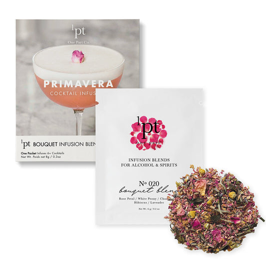 Two packages of 'pt' cocktail infusion blends with a bouquet of dried flowers on a white background.