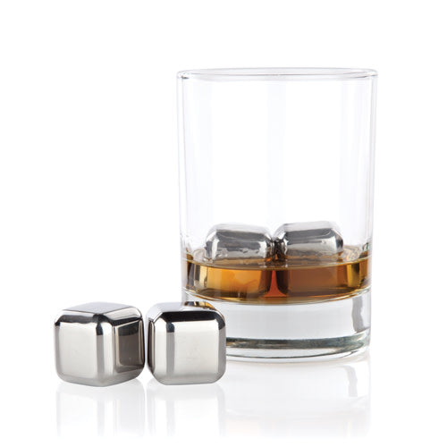 Glass of whiskey with metal ice cubes on a white background