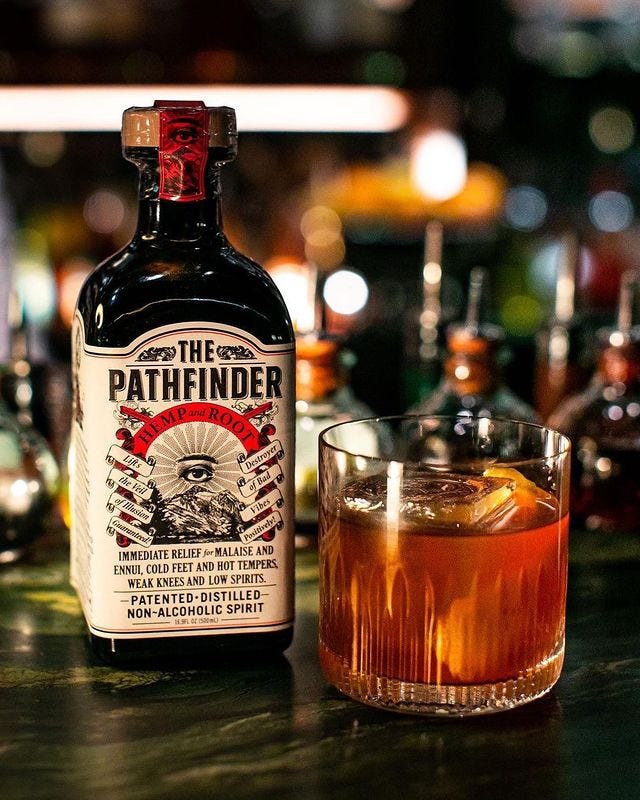 black pathfinder bottle with cocktail